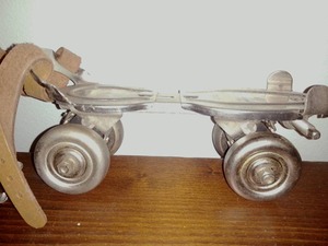lot 49 image: Vintage Globe Ball Bearing Roller Skates,