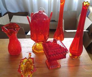 lot 104 image: Mid-century modern orange glass vases and more.