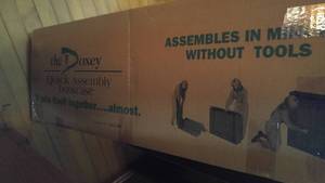 lot 117 image: New in box Cherry colored bookcase,