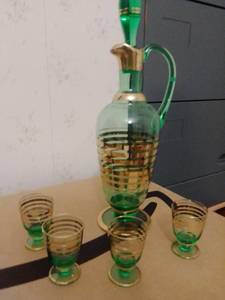 lot 134 image: Czech and Etched glass decanter sets.