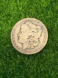 lot 17 image: 1891-O Morgan Silver Dollar