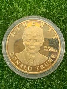 lot 24 image: Donald Trump  Statue of Liberty Coin