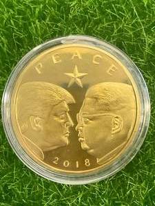 lot 43 image: Donald Trump  Kim Jong Un Peace Coin