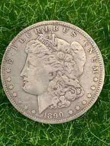lot 55 image: 1890-O Morgan Silver Dollar