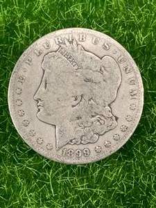 lot 56 image: 1899-O Morgan Silver Dollar