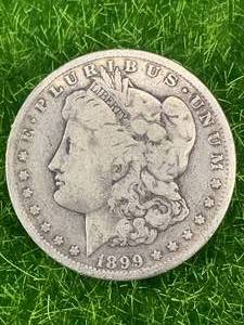 lot 62 image: 1899-O Morgan Silver Dollar