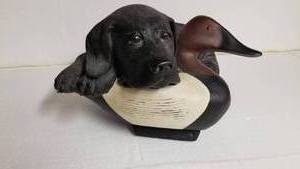 lot 90 image: Ducks Unlimited Black Lab Pup with Decoy Sculpture