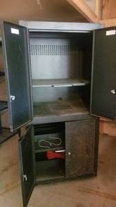 lot 166 image: Tall Black Rolling 4 Door Metal Cabinet