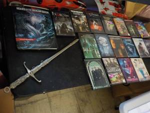 lot 169 image: Sword and DVDs and book...