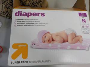lot 34 image: UP and Up box of 124 size N Diapers...