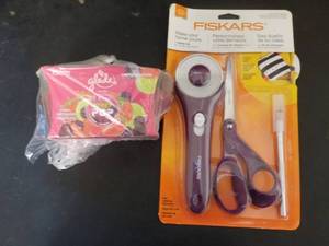 lot 56 image: Fiskars Sewing Kit and Glade Candle...