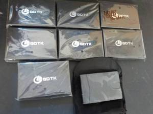 lot 256 image: 8 GDTK Billfolds...