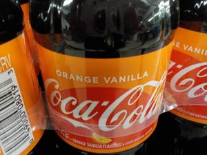 lot 302 image: Case of 24 Bottles Orange Vanilla C...