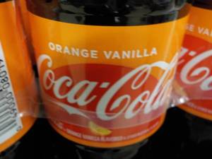 lot 303 image: Case of 24 Bottles Orange Vanilla C...