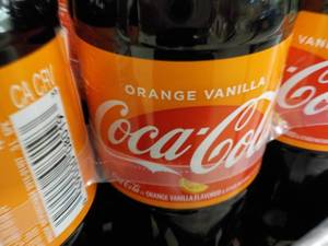 lot 305 image: Case of 24 Bottles Orange Vanilla C...