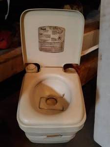 lot 17 image: New Old Stock porta potty for boat or camper.