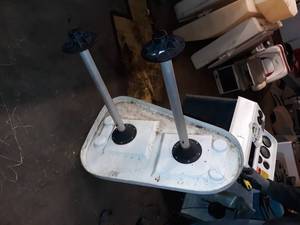 lot 25 image: In floor table mount, legs sit flush with floor. 36 inches long.