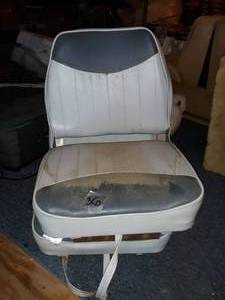 lot 36 image: A pair of flip up fishing seats with swivels on bottom.