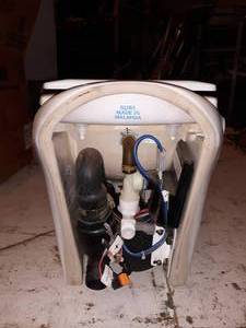 lot 65 image: Porcelain head toilet design for a boat or RV.
