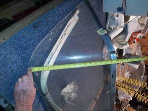 lot 71 image: Old curved poly windshield with no walk through.