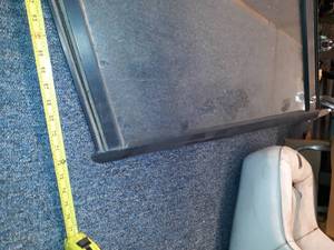 lot 73 image: Glass windshield off unknown application.