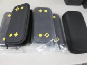 lot 211 image: 5 Nintendo Switch Zip Cases, Zip Ca...