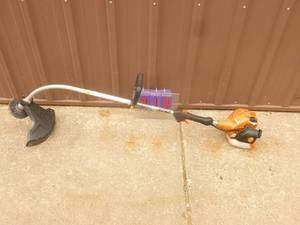 Echo gas weed trimmer. Lightly used. Tested & works. As shown.