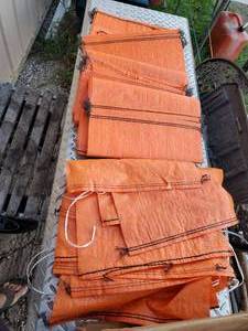 lot 63 image: Box of unused landscaping sandbags
