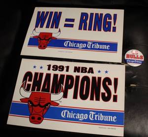lot 17 image: 1991 Star Tribune News Stand Champions Signs & 1991 Go Bulls Button