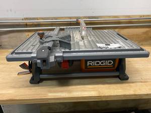lot 102 image: RIDGID 6.5 Amp Corded 7 in. Table Top Wet Tile Saw