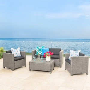 lot 77 image: Puerta Mixed Black 4-Piece Wicker Outdoor Sectional Set With Cushions