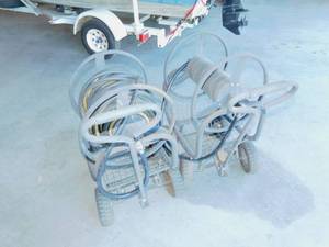 lot 48 image: Two Hose Carts with One Hose