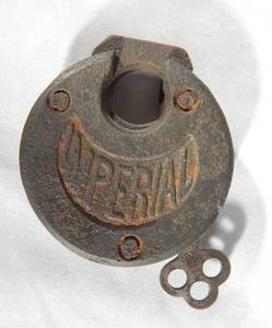 lot 25 image: Antique Imperial Pancake Padlock With Key