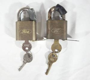 lot 29 image: Set of Two Vintage Ford Motor Company Brass Padlocks