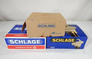 lot 80 image: Lot of 3 New Schlage Keyed Locking Entrance Brass Door Lever Sets