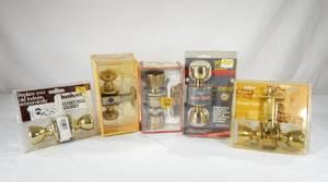 lot 83 image: Lot of New and New Vintage Polished Brass Passage Latch Door Knob Sets