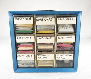 lot 182 image: Akro-Mills 9 Drawer Mountable Metal Storage Cabinet With Lock Pins and Core Caps