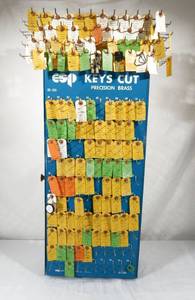 lot 214 image: Large Vintage ESP Rotating Key Display Metal Storage Cabinet