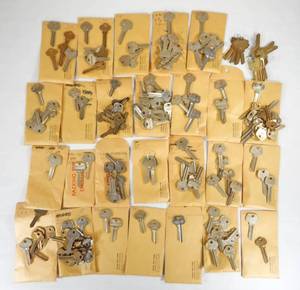 lot 253 image: Lot of Assorted Imprinted and Stamped Key Blanks