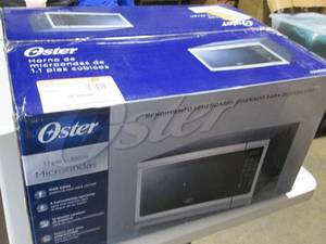lot 52 image: Oster 11CU. FT. Microwave In Box...