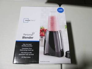 lot 215 image: Mainstays Personal Blender...