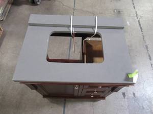 lot 102 image: Home Decorators Collection Naples 30 in. W x 22 in. D Bathroom Vanity Cabinet in Tobacco with Engineered Marble Vanity Top and Basin NATA3621D-SST