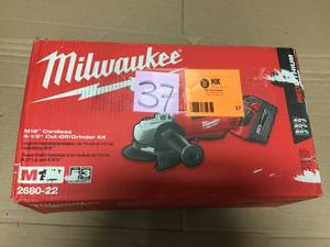 Milwaukee M18 18-Volt Lithium-Ion Cordless 4-12 in. Cut-Off Grinder Kit with (2) 3.0Ah Batteries, Charger, Tool Bag in good condition