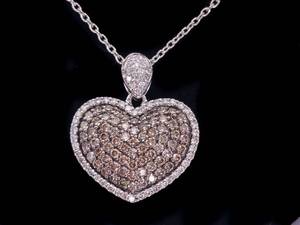 lot 13 image: Fancy 2.00 Carat Pave Cocoa Chocolate and White Diamond Heart Shaped Pendant in 18k White Gold $4900 Appraisal