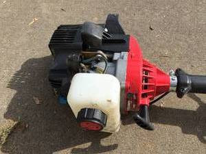 lot 232 image: Yard Machines 17 Inch Gas Powered Weed Whip