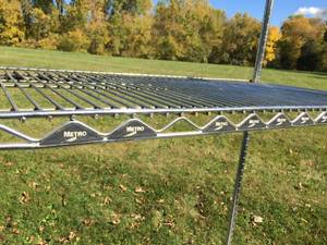 lot 265 image: Metal Metro Storage Rack On Wheels