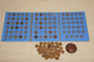 lot 66 image: Pennies in a Folder