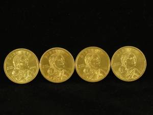 lot 70 image: (4) Sacagawea Dollar Coins
