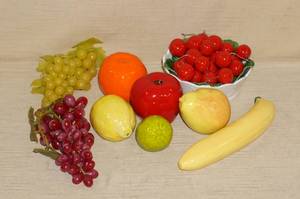 lot 168 image: Ceramic and Rubber Fruit