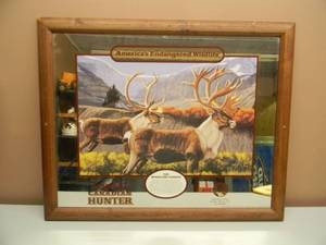 lot 81 image: SEAGRAMS CARIBOU MIRROR - APPROX 31 BY 25 - SEE PICTURES